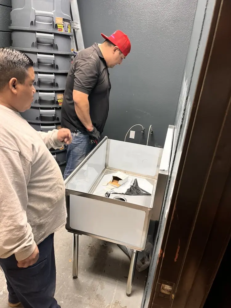 Commercial plumbing and sink installation in Kincaid